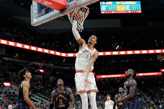 Dec 15, 2023; San Antonio, Texas, USA; San Antonio Spurs forward Victor Wembanyama (1) dunks during the first half against the Los Angeles Lakers at Frost Bank Center.